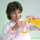 Johns Hopkins scientist Roberta Ivey examines a lab sample of
spaniel urine.